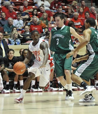 Sophomore Jamal Fenton drives the baseline Wednesday against ENMU.