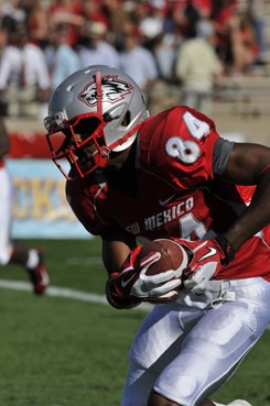 Wide receiver Ty Kirk runs the ball
