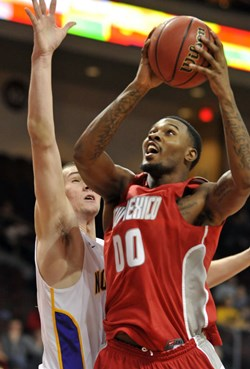 New Mexico's A.J. Hardeman goes up for the shot against Northern Iowa's Jake Koch.