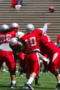 QB Brad Gruner fires this pass for the Cherry squad.