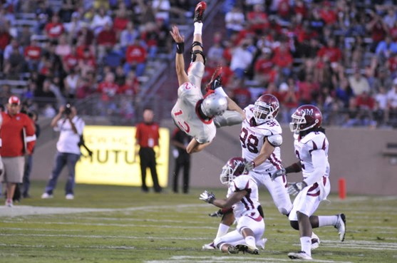 Lobo quarterback B.R. Holbrook takes a hard hit