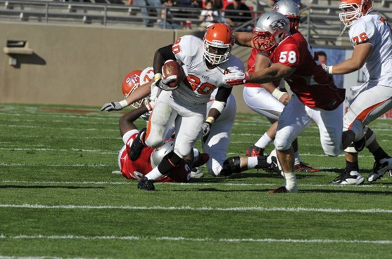 Carmen Messina tackles Sam Houston's Tim Flanders