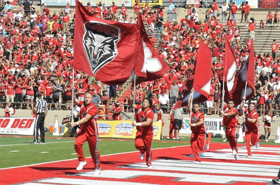 The Lobos celebrate after scoring a touchdown vs. Southern University. The Lobos had six trips to the endzone in the first half. (Dave Benyak)