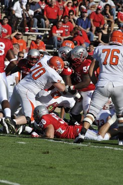 Lobo defensive line
 Rod Davis (50), Carmen Messina (58)