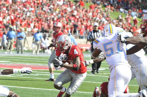 Junior running back Demarcus Rogers rushes for a touchdown vs. Southern University. Rogers racked up 57 yards on the ground in the first half (Dave...