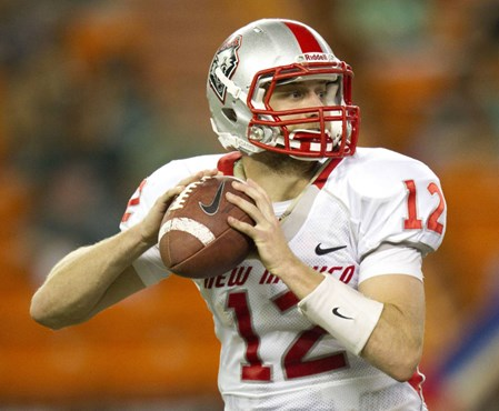 New Mexico quarterback B.R. Holbrook (12) looks for an open receiver in the second quarter of an NCAA college football game Saturday, Oct. 13, 2012,...