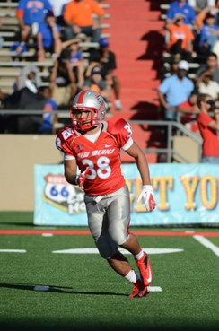 David Anaya, the New Mexico Man, runs on the field versus Boise State.