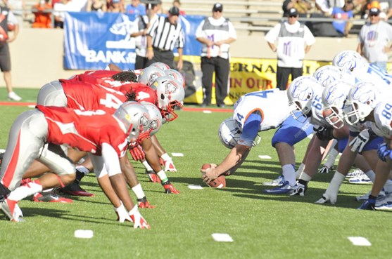 The Lobos defensive front lines up versus Boise State's offensive line.